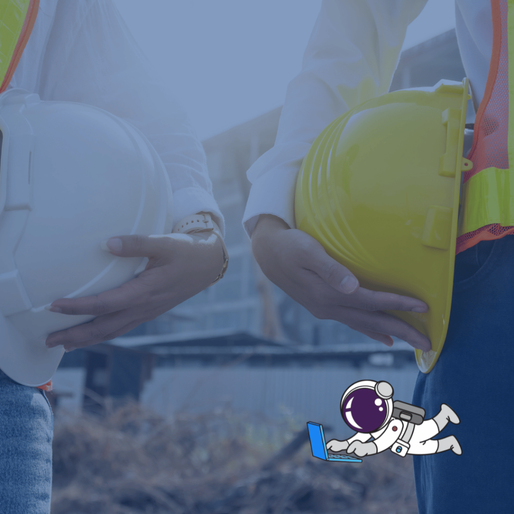 Two people in hard hats, discussing a contractos project.